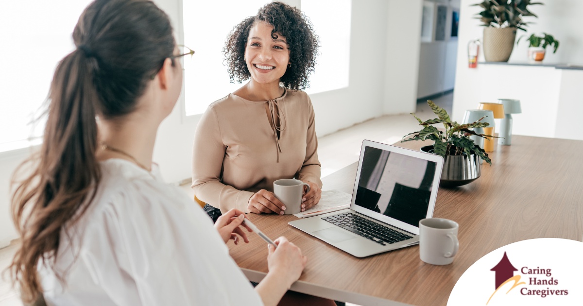 A woman interviews for a job position representing one of the steps during which a caregiver should be evaluating if an agency is a good fit.