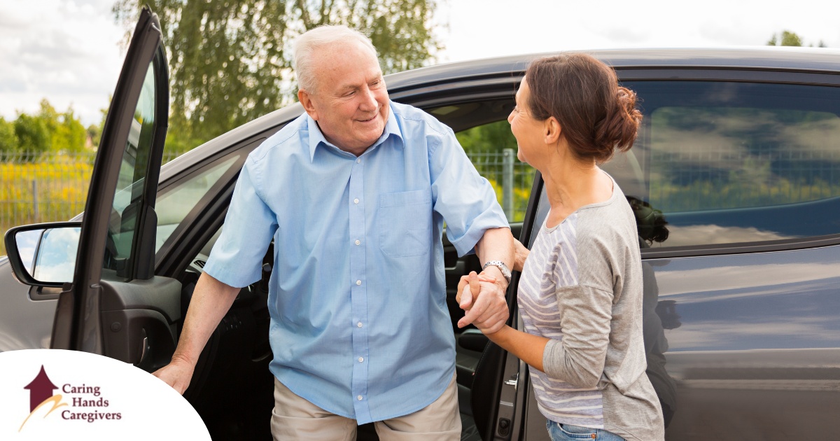 A caregiver helps a senior carefully get out of the care, representing the safety that those who work in home care should strive for.