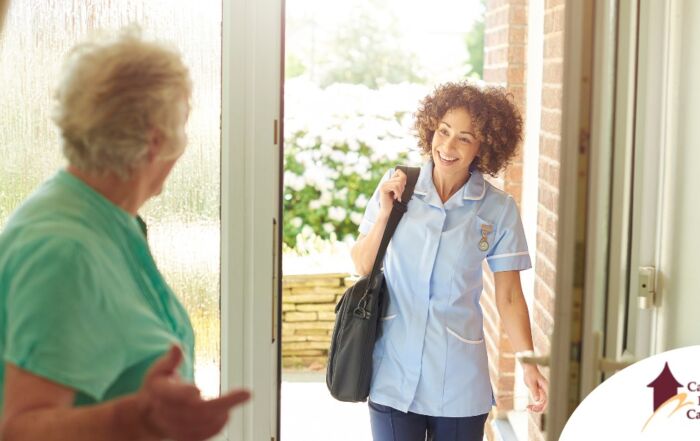 A caregiver comes in to see a client at home representing senior home care and the services offered.