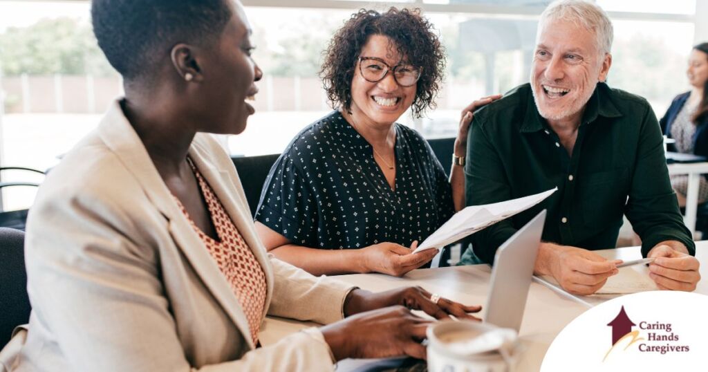 A couple talks with and advisor, representing the type of preparation that is crucial for successful senior care planning.