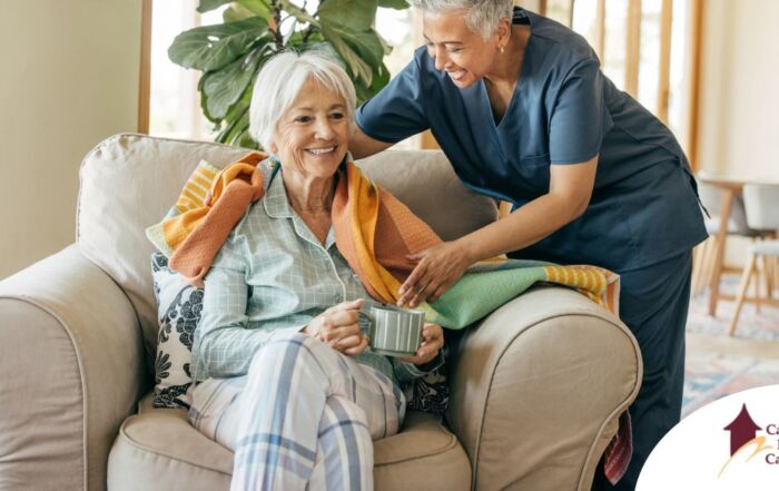 An aide provides home health care support for chronic conditions