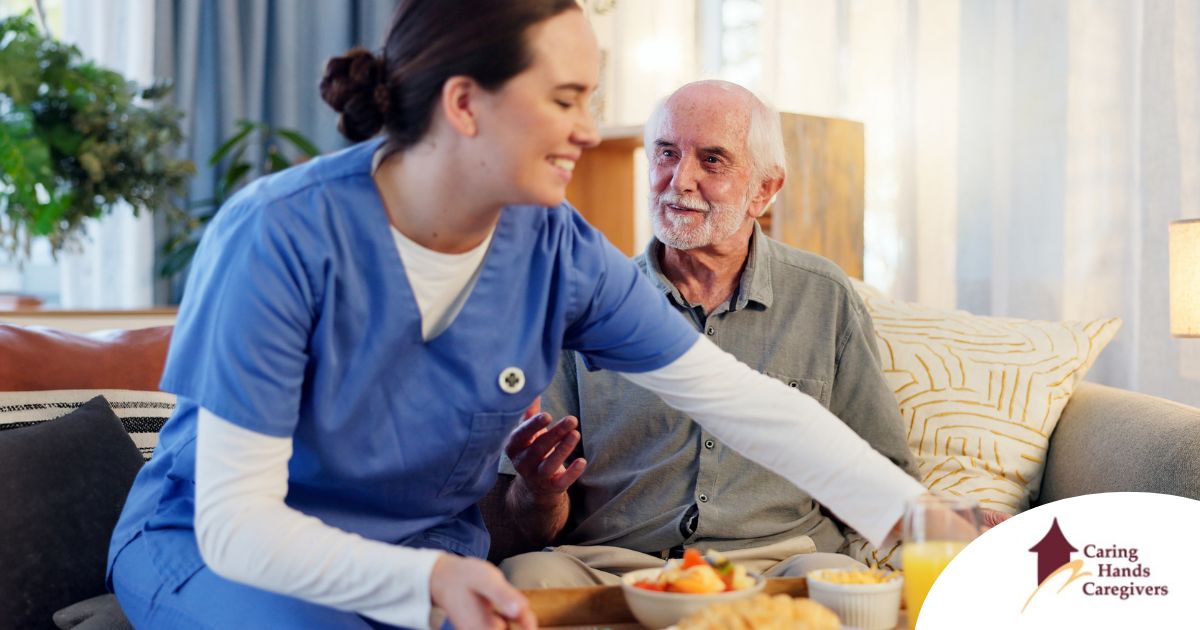 Caregiver providing senior care at home to manage parkinson’s and related symptoms.