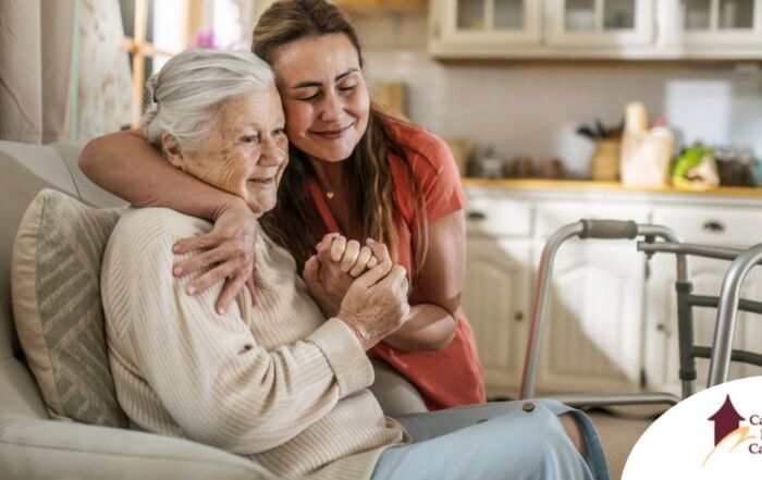Caregiver supporting an elderly woman in the transition to senior home care