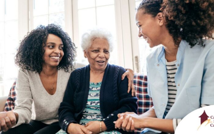 Caregiver talking to a family about Elderly Care