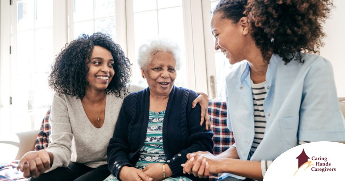 Understanding the Reasons behind Resistance to Elderly Care Caregiver talking to a family about Elderly Care